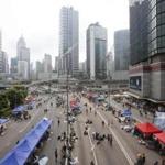 Pro-democracy student protesters continued to occupy the streets around the government complex in Hong Kong on Thursday.